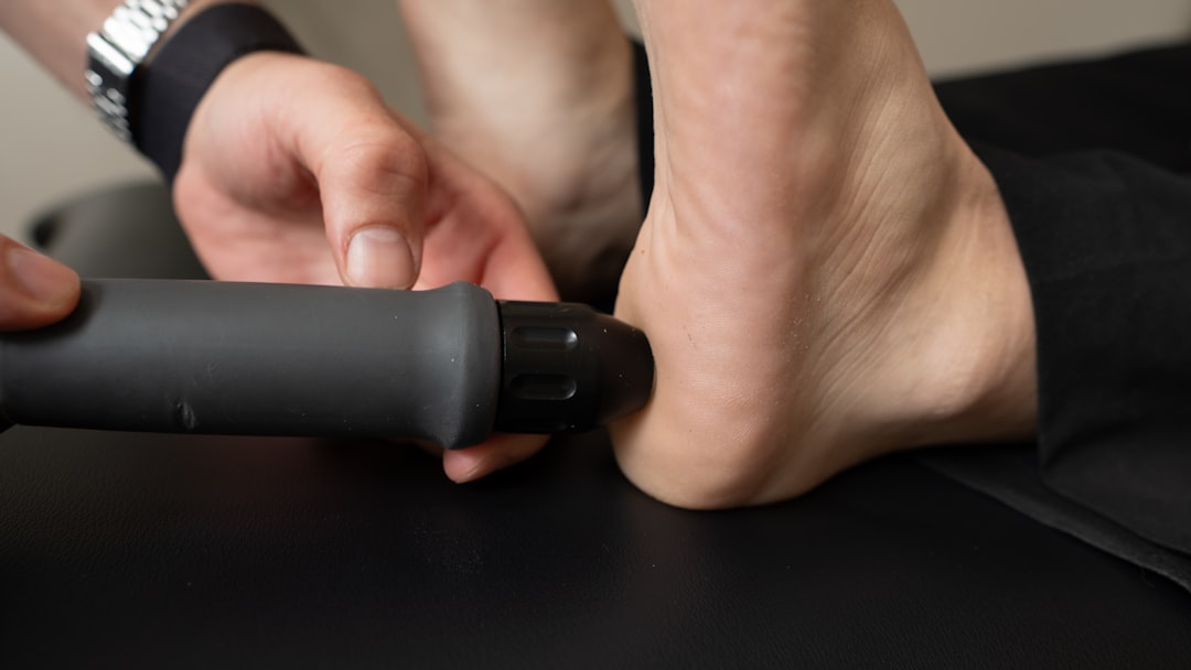 Close-up of a person receiving treatment on their heel