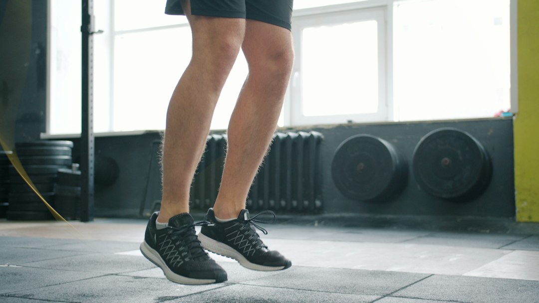 Man jumping rope in a gym