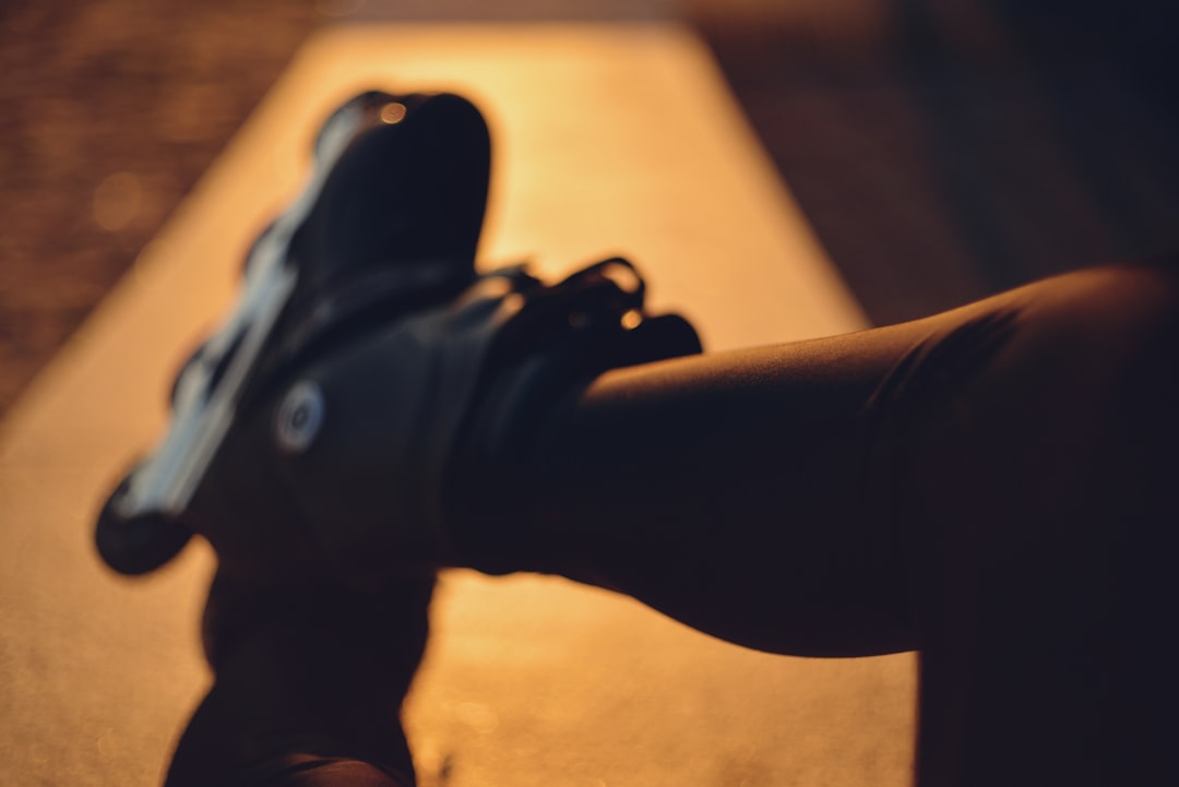 Person's leg and shoe on a path